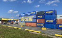 Containers stored at the port of Hamburg. An advertise for our container storage is printed on one container