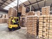 The warehouse in Dongen where tea bags are stacked on pallets with a forklift