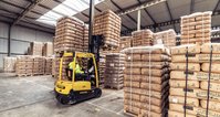The warehouse in Dongen where tea bags are stacked on pallets with a forklift